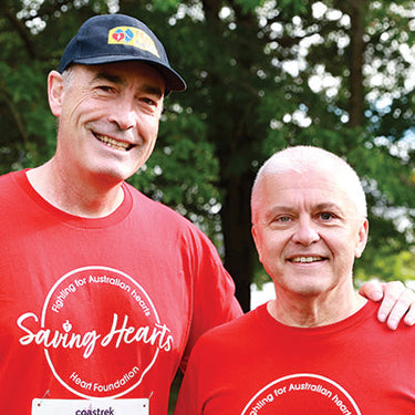 Greg Page, CEO of Heart of the Nation, and David Lloyd, CEO of the Heart Foundation, standing side by side in red Saving Hearts t-shirts
